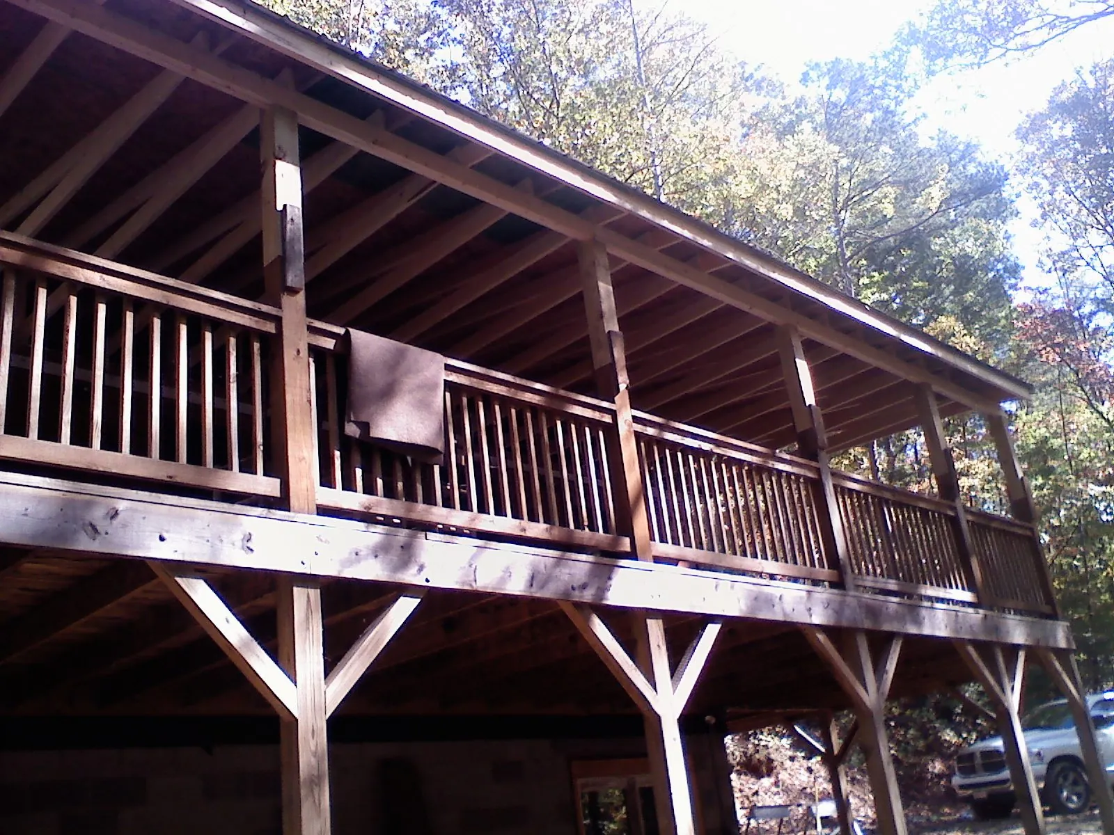 Timber framing under a new elevated porch and deck — Roof Leak Repair in Silverado by Roofing Brothers